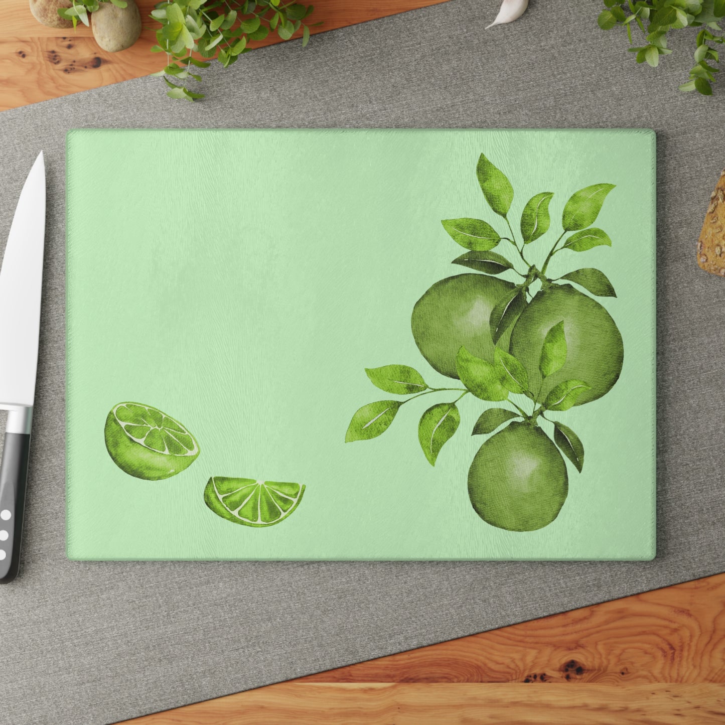 Glass Cutting Board featuring Limes by Lynn Salem Creates